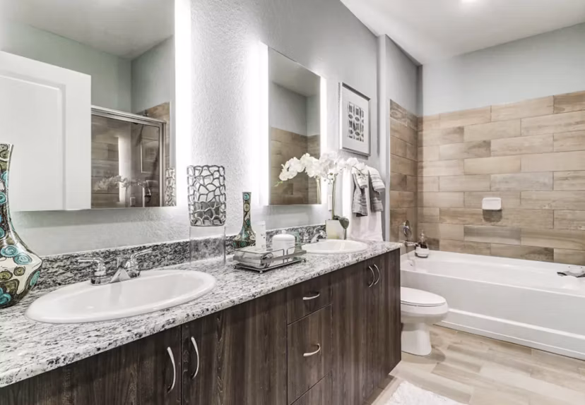 Luxurious bathroom with marble finishes at Venetian Isle Apartments
