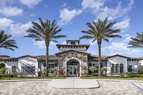 Elegant clubhouse and leasing office at Venetian Isle Apartments featuring modern architecture and stylish decor