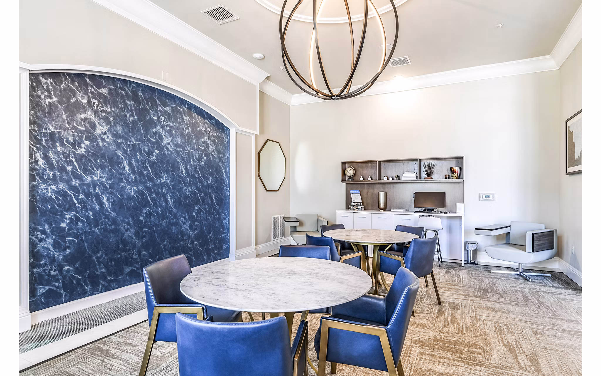 Clubhouse business center with modern workstations at Venetian Isle Apartments, ideal for remote work and meetings