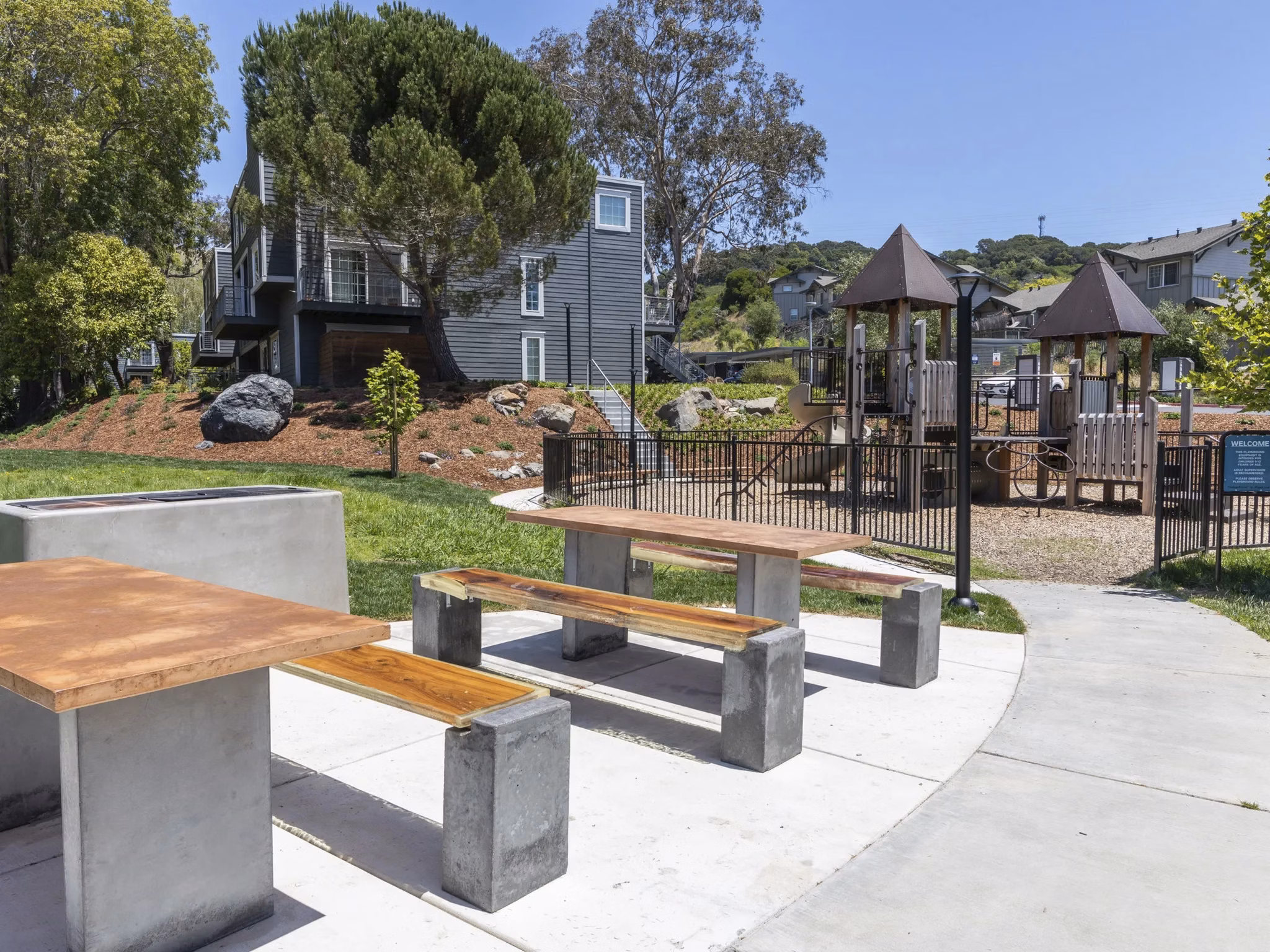 patio/playground at Serenity at Larkspur Apartments