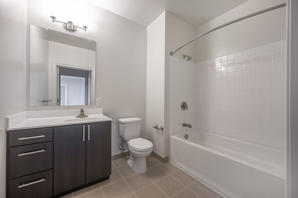 Modern bathroom with sleek fixtures at Arlington 360 Apartments