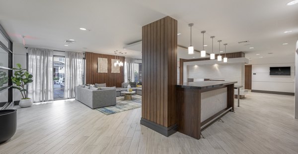Clubhouse with modern design and outdoor seating at Arlington 360 Apartments, a luxury community by Greystar