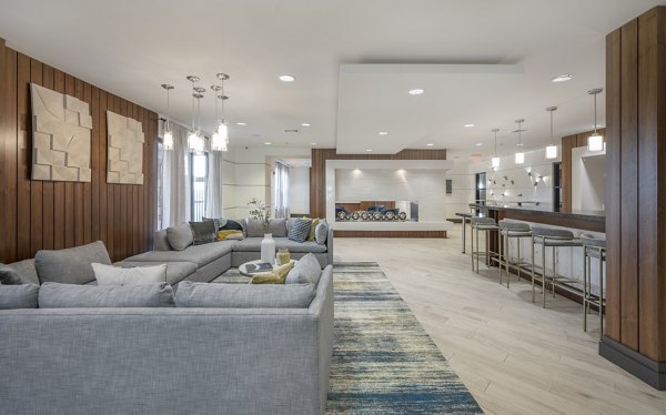 Clubhouse with modern amenities at Arlington 360 Apartments, ideal for social gatherings and relaxation moments
