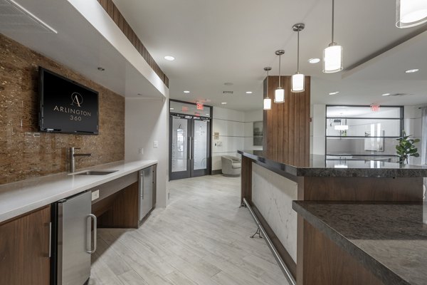 Modern clubhouse with stylish seating and entertainment areas at Arlington 360 Apartments