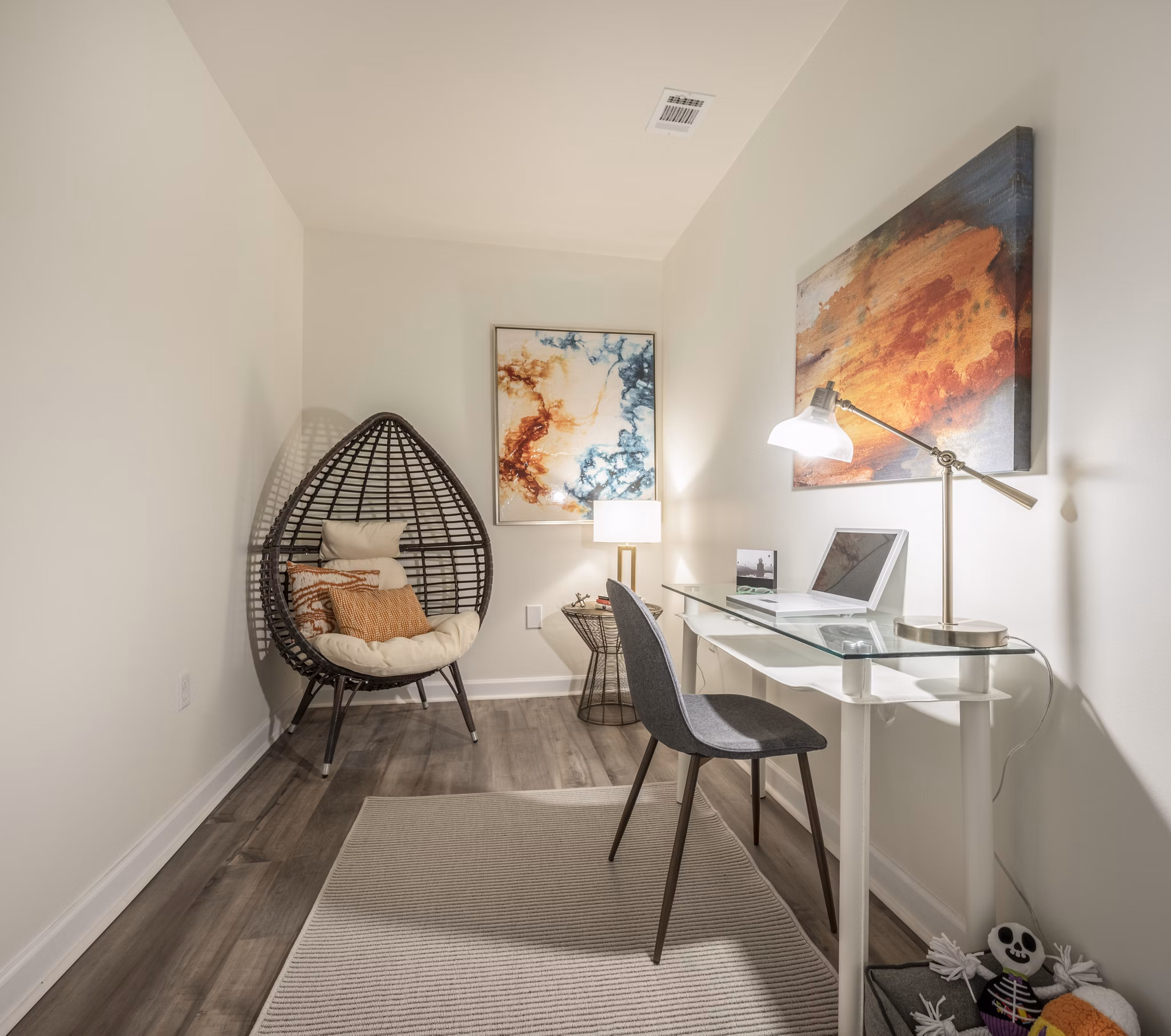 Home office space with modern desk and ergonomic chair in Arlington 360 Apartments, perfect for remote work and productivity