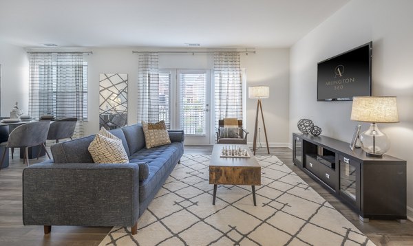 Spacious living room with modern decor at Arlington 360 Apartments