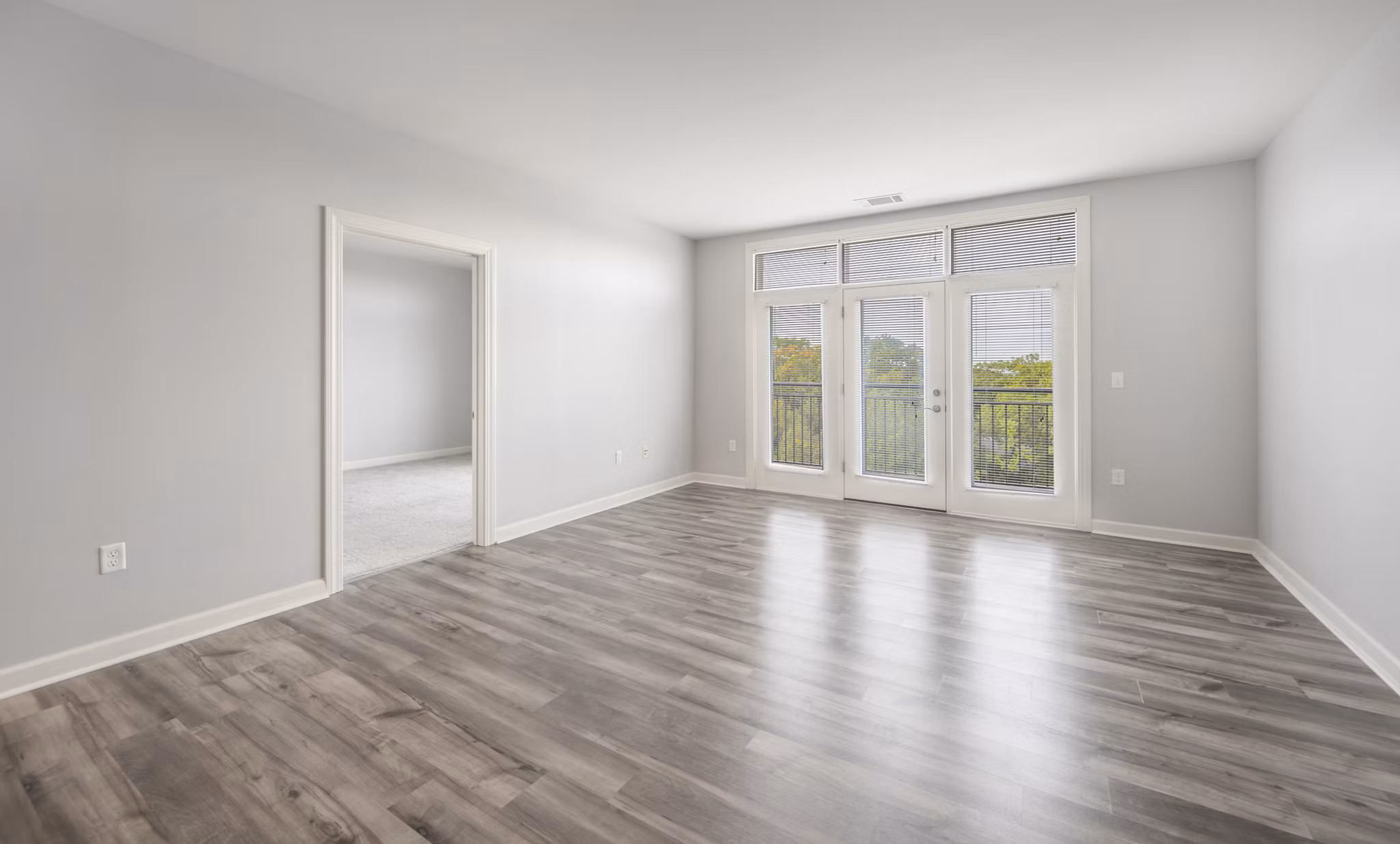 Spacious living room with contemporary furnishings at Arlington 360 Apartments