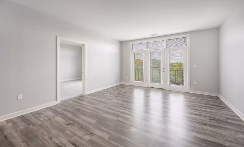 Spacious living room with contemporary furnishings at Arlington 360 Apartments