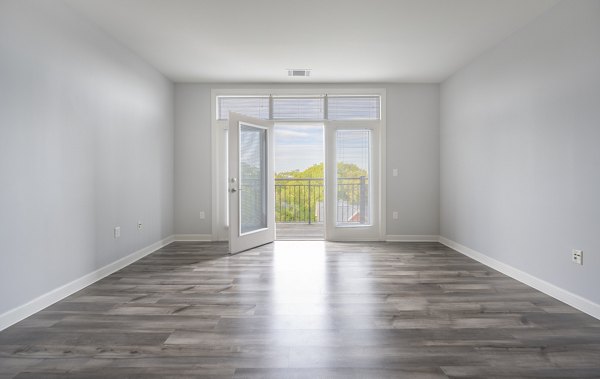 Contemporary living room with chic furnishings at Arlington 360 Apartments