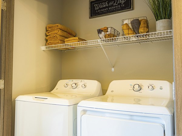 Laundry room with state-of-the-art appliances at Broadway190 Apartments, perfect for convenient and efficient living in luxury apartments