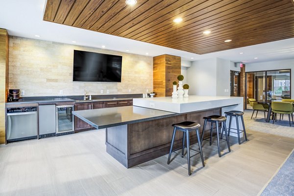Clubhouse lobby featuring modern seating and stylish decor at The Jameson at Kincora Apartments