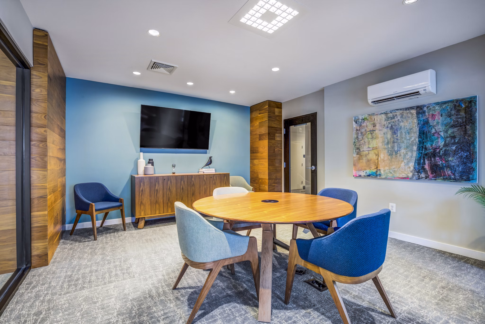 Clubhouse lounge featuring modern decor and communal seating at The Jameson at Kincora Apartments
