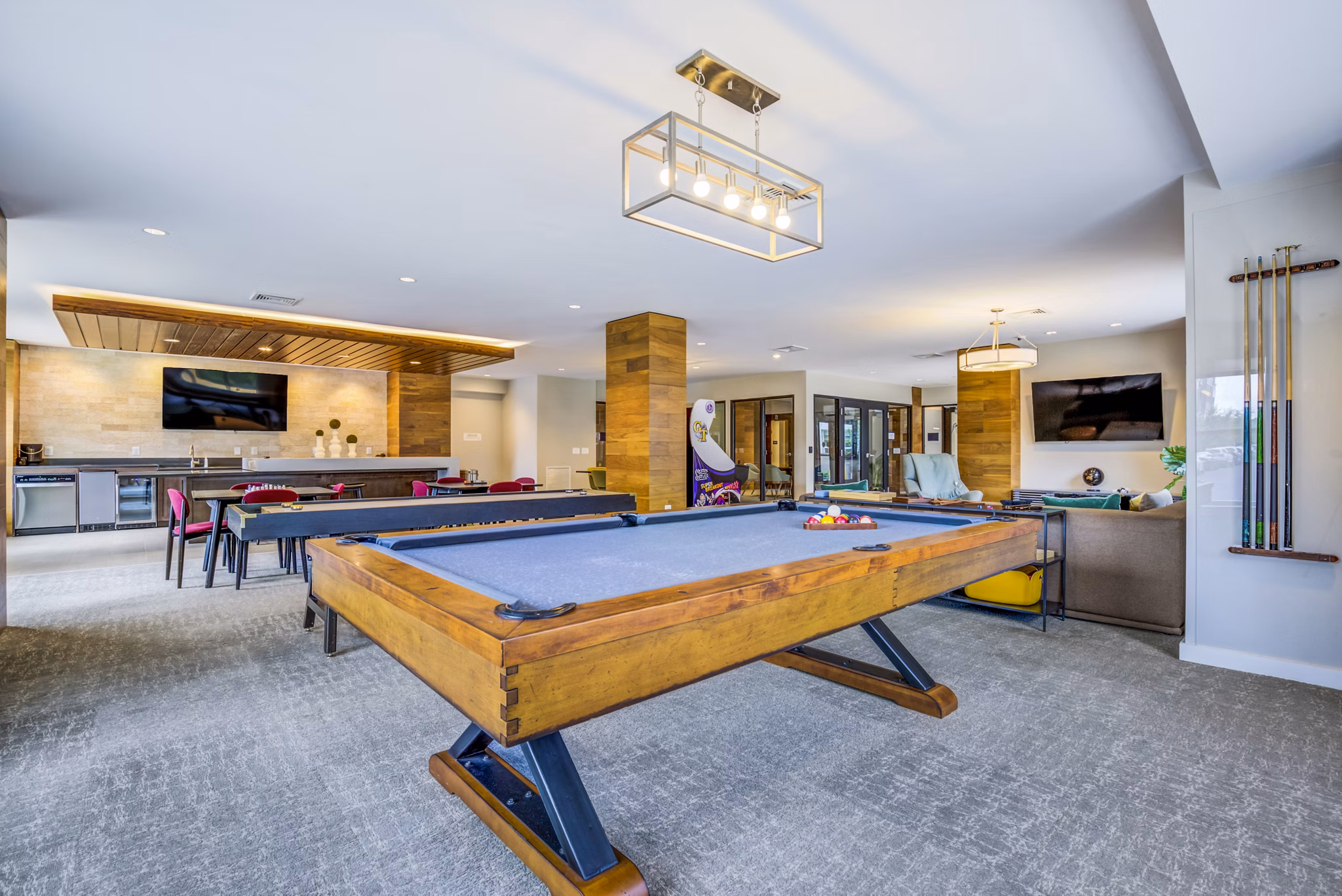 Clubhouse/lobby featuring modern decor and seating at The Jameson at Kincora Apartments