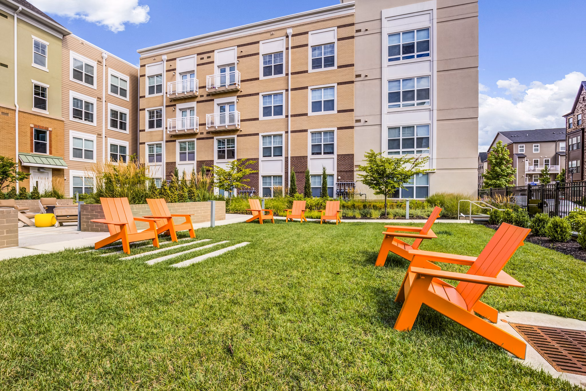 Charming outdoor patio at The Jameson at Kincora Apartments, perfect for relaxation and communal gatherings