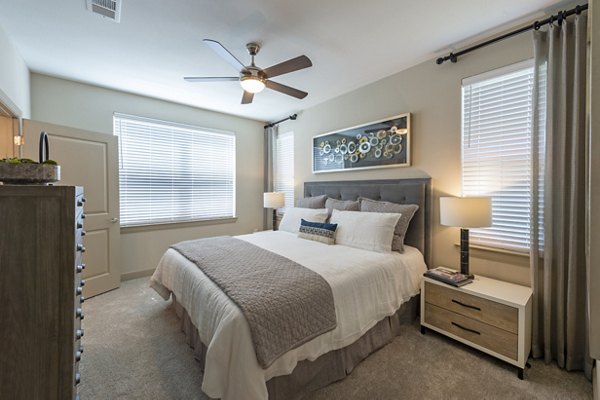 Spacious bedroom with modern decor at Domain Morgans Landing Apartments, perfect for luxury living