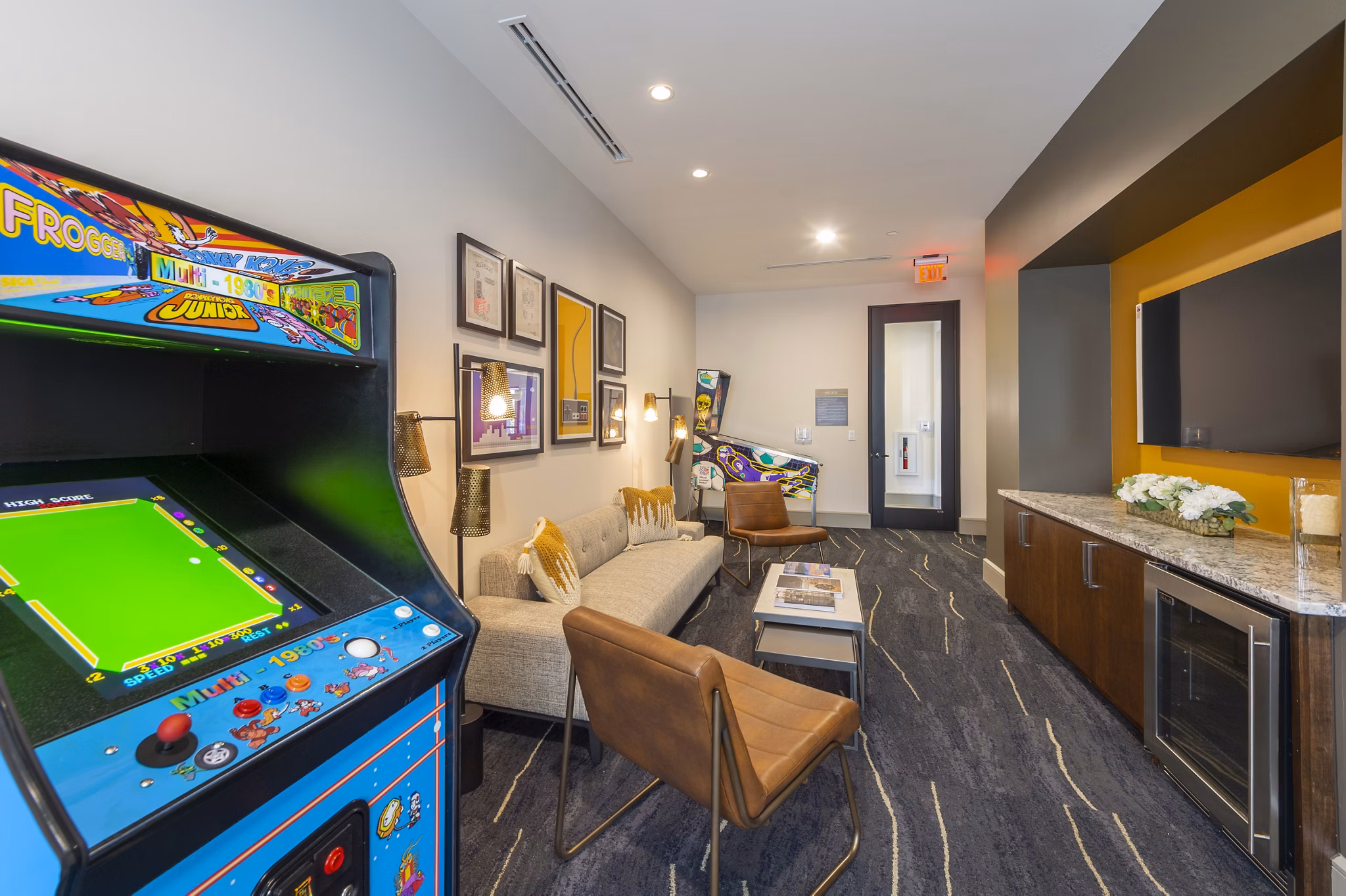 Game room with pool table and modern seating at Domain Morgans Landing Apartments