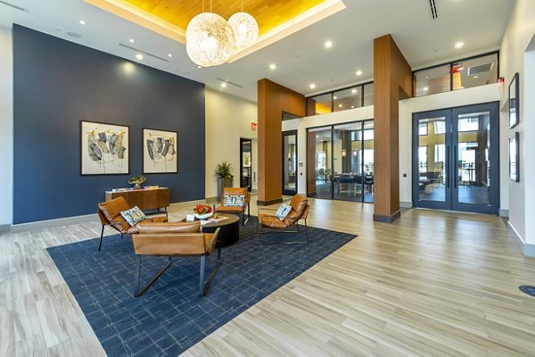 Modern clubhouse featuring elegant design and amenities at Domain Morgans Landing Apartments