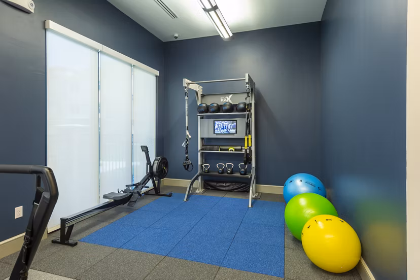 fitness center at Domain Morgans Landing Apartments