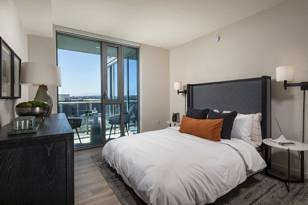 Modern bedroom with stylish decor in ARQ Apartments, Greystar's luxury living experience in the heart of the city