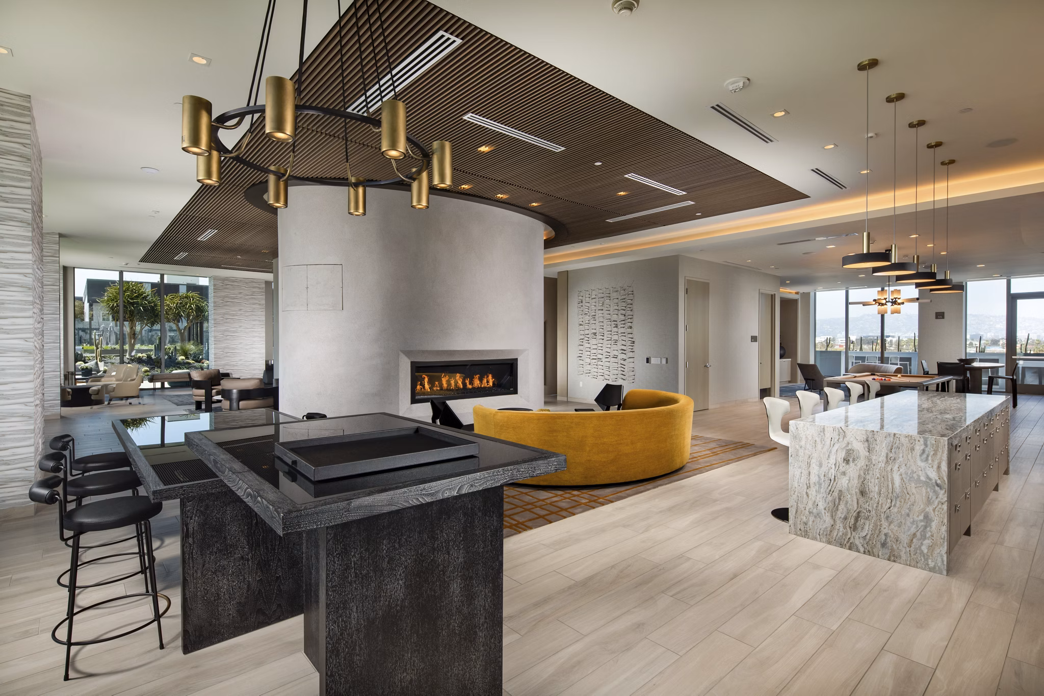 Modern clubhouse with sleek design and seating at ARQ Apartments Perfect for gatherings and relaxation in a luxury setting