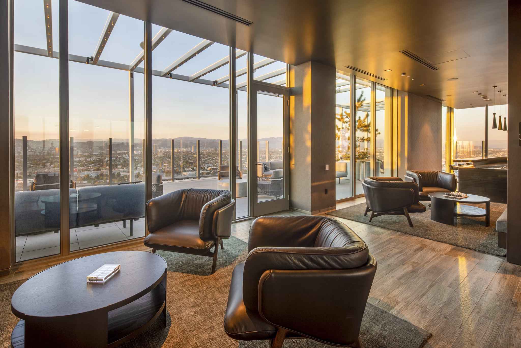Stylish clubhouse featuring modern decor and comfortable seating at ARQ Apartments