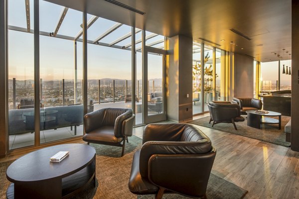 Stylish clubhouse featuring modern decor and comfortable seating at ARQ Apartments