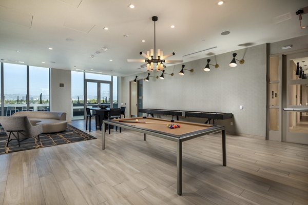 game room at ARQ Apartments