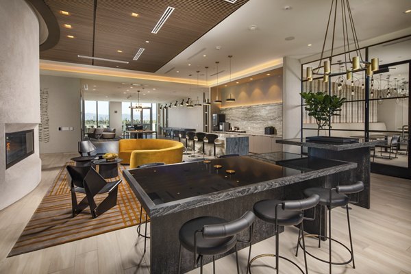 Clubhouse with stylish seating and modern decor at ARQ Apartments in the Greystar luxury community