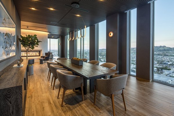 Elegant clubhouse with modern furnishings at ARQ Apartments, a Greystar luxury community