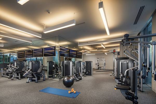 fitness center at ARQ Apartments