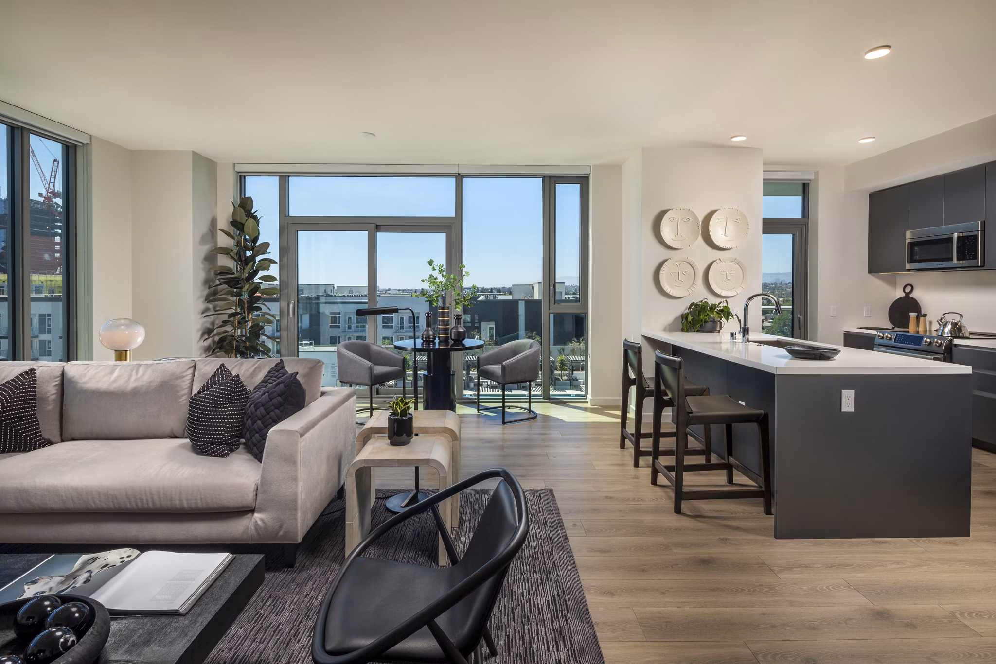Stylish kitchen with stainless steel appliances in ARQ Apartments