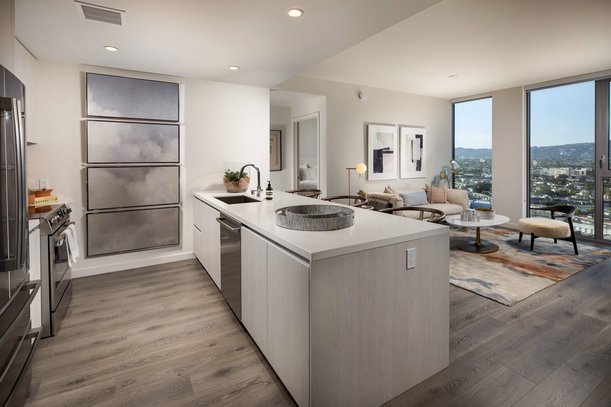 Modern kitchen with stainless steel appliances at ARQ Apartments, luxury living in a vibrant community