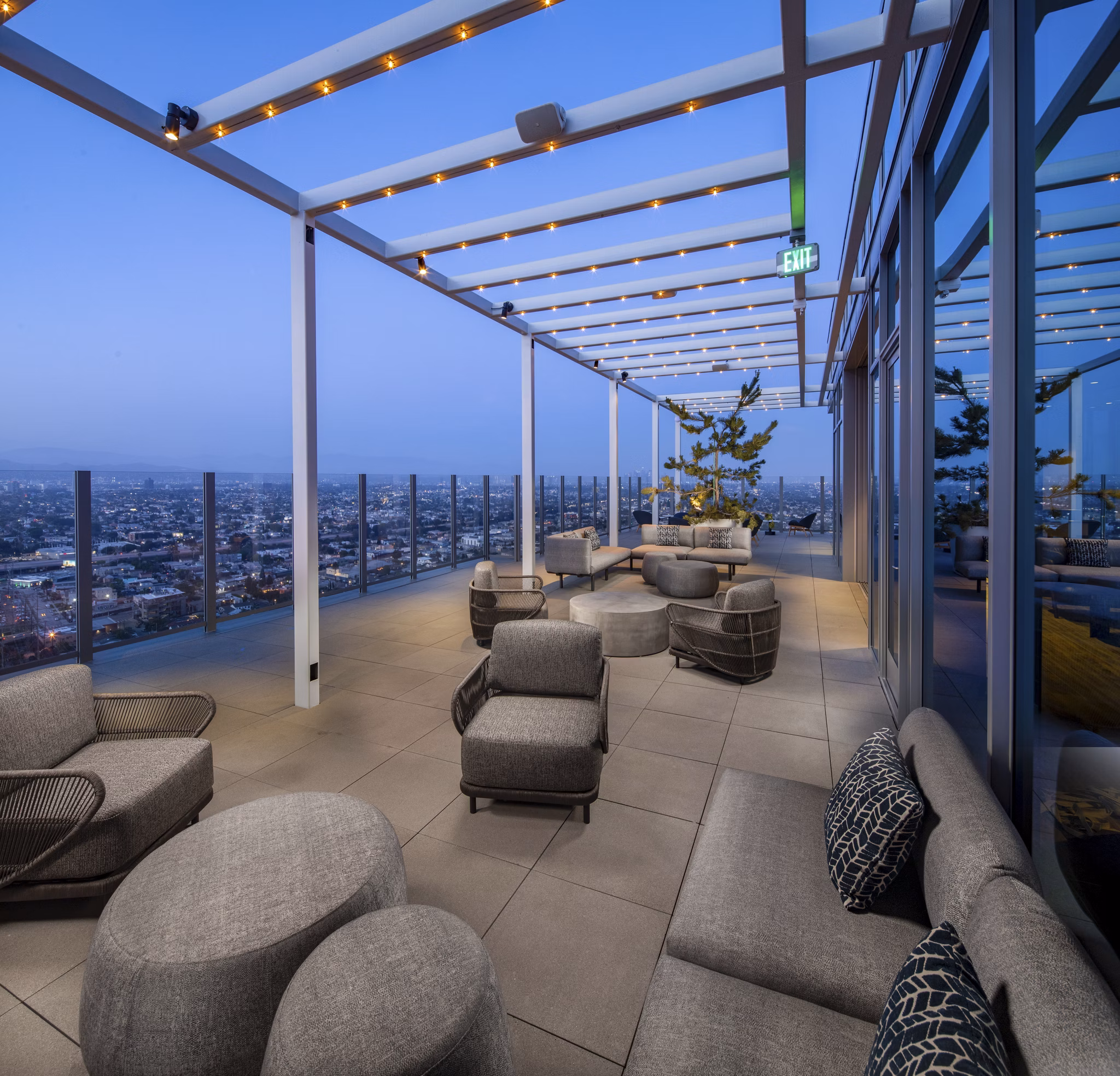 Rooftop deck with stunning city views at ARQ Apartments