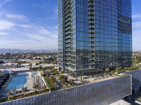 Skyline view from a luxurious balcony at ARQ Apartments: Premiere high-rise living in downtown Los Angeles