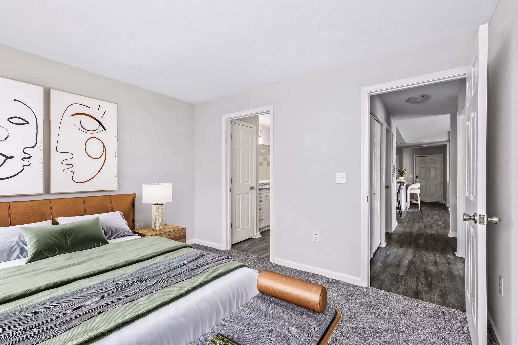Bedroom featuring elegant decor and modern furniture at Banyan Grove Apartments, luxury living spaces designed for comfort and style
