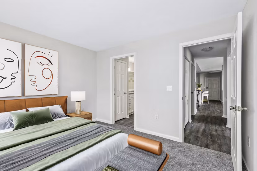 Bedroom featuring elegant decor and modern furniture at Banyan Grove Apartments, luxury living spaces designed for comfort and style