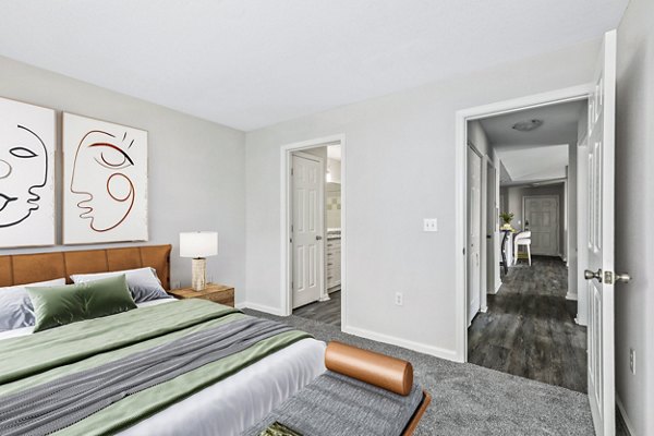 Bedroom featuring elegant decor and modern furniture at Banyan Grove Apartments, luxury living spaces designed for comfort and style
