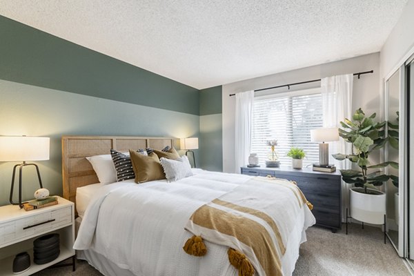 bedroom at The Luxe Apartments