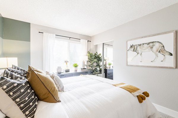 bedroom at The Luxe Apartments