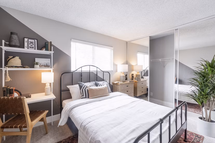 bedroom at The Luxe Apartments