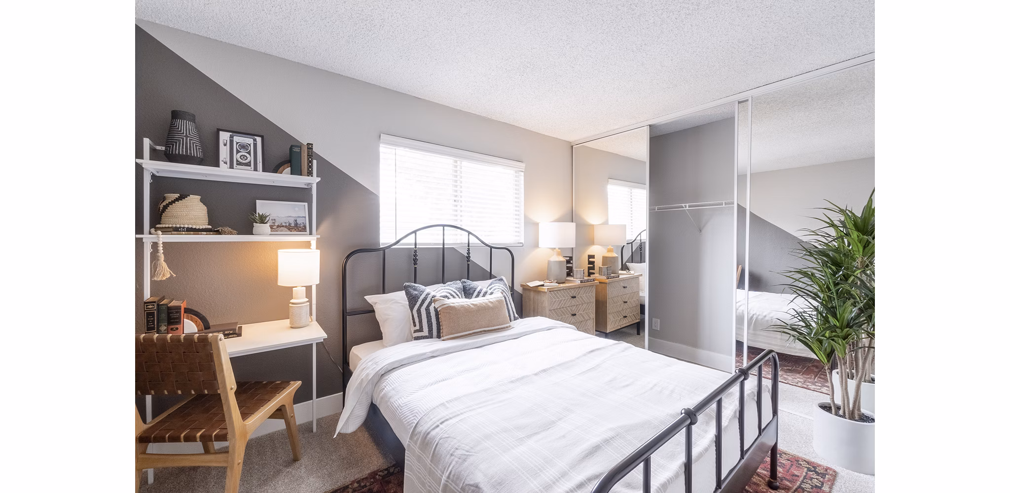 bedroom at The Luxe Apartments