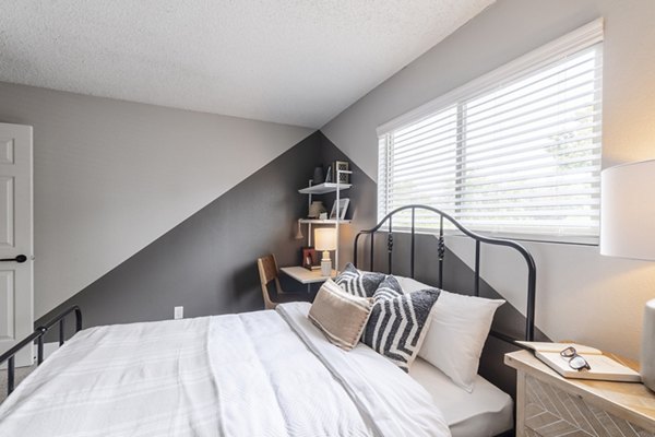 bedroom at The Luxe Apartments