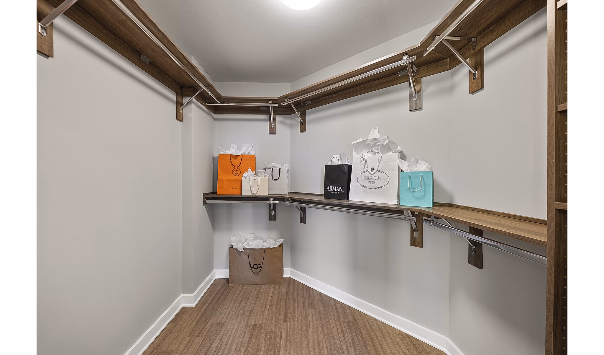 Spacious bedroom closet with custom shelving in Element SouthPark Apartments, featuring ample storage space for luxury living