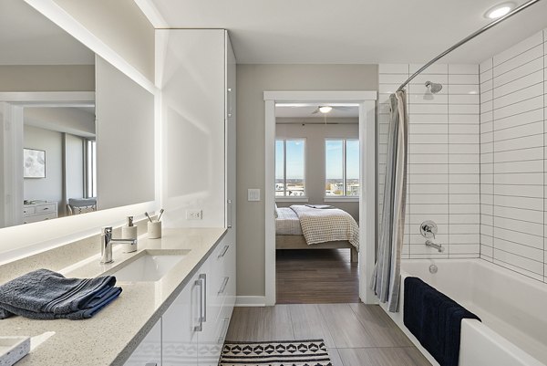 Elegant bathroom featuring modern fixtures in Element SouthPark Apartments
