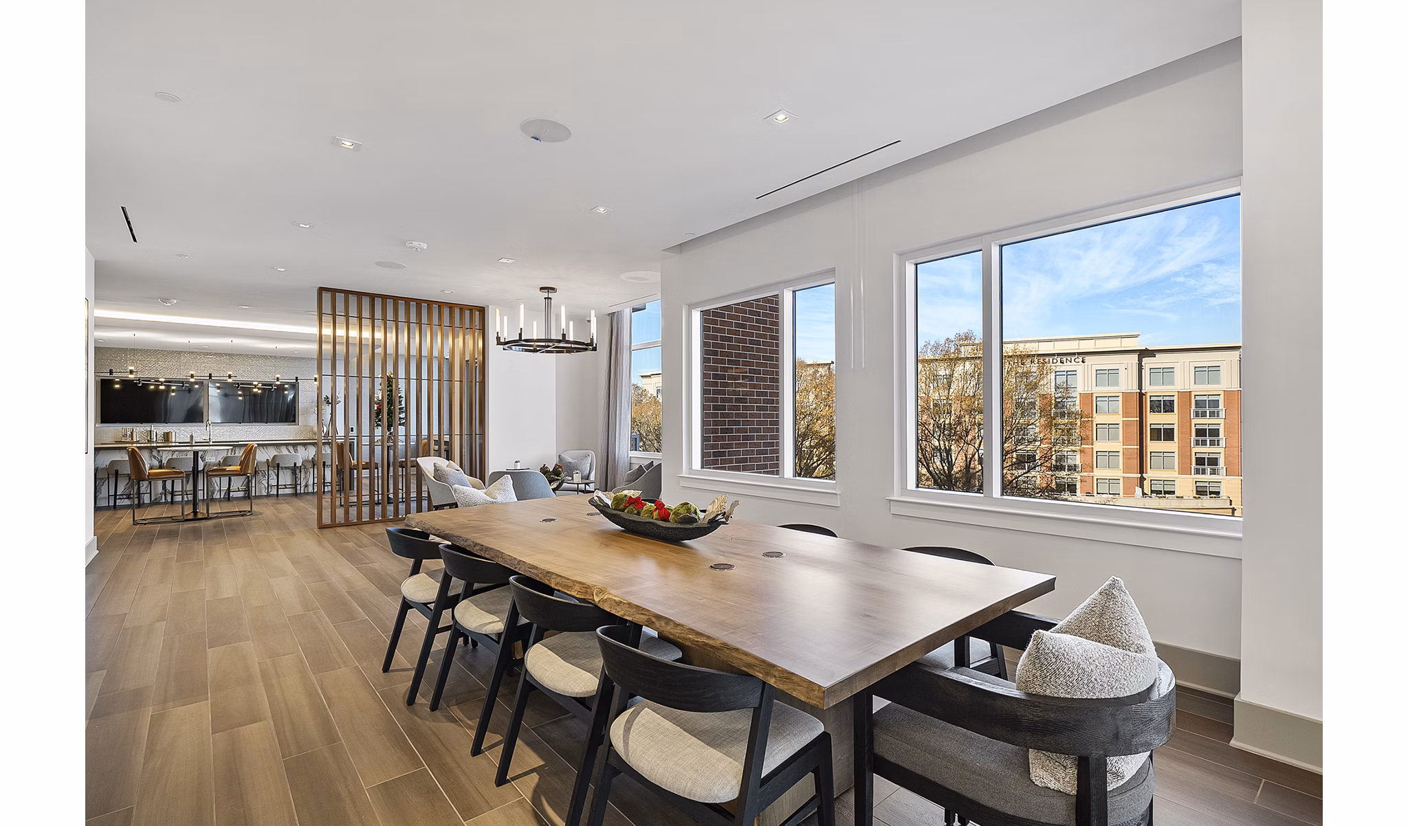 Spacious clubhouse with stylish seating and vibrant decor at Element SouthPark Apartments, ideal for luxury gatherings and events