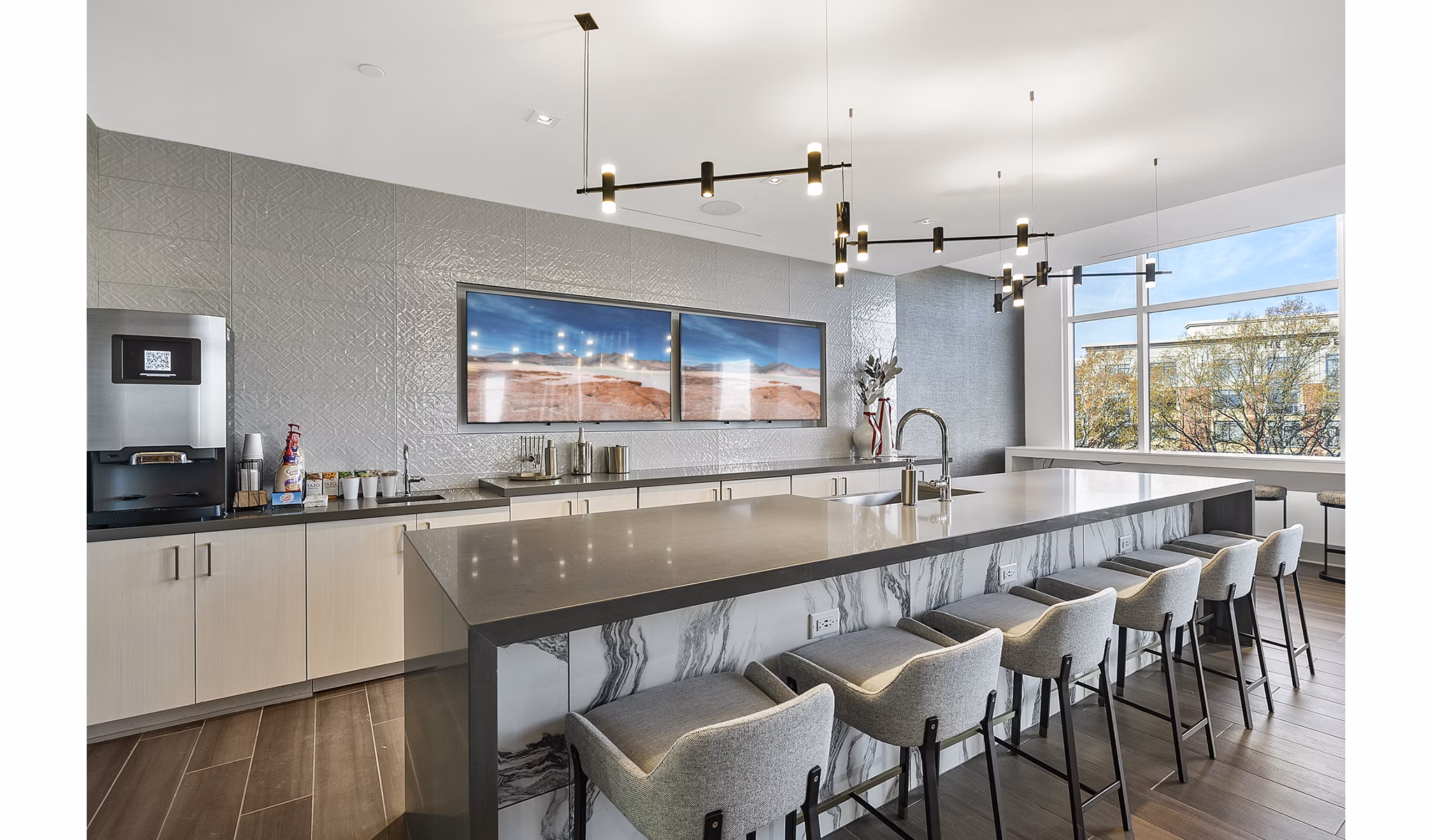 Stylish clubhouse with modern seating at Element SouthPark Apartments, a Greystar luxury property in Charlotte, NC