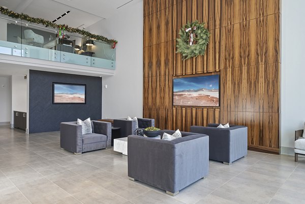 Elegant clubhouse lobby with modern decor at Element SouthPark Apartments, offering luxury amenities