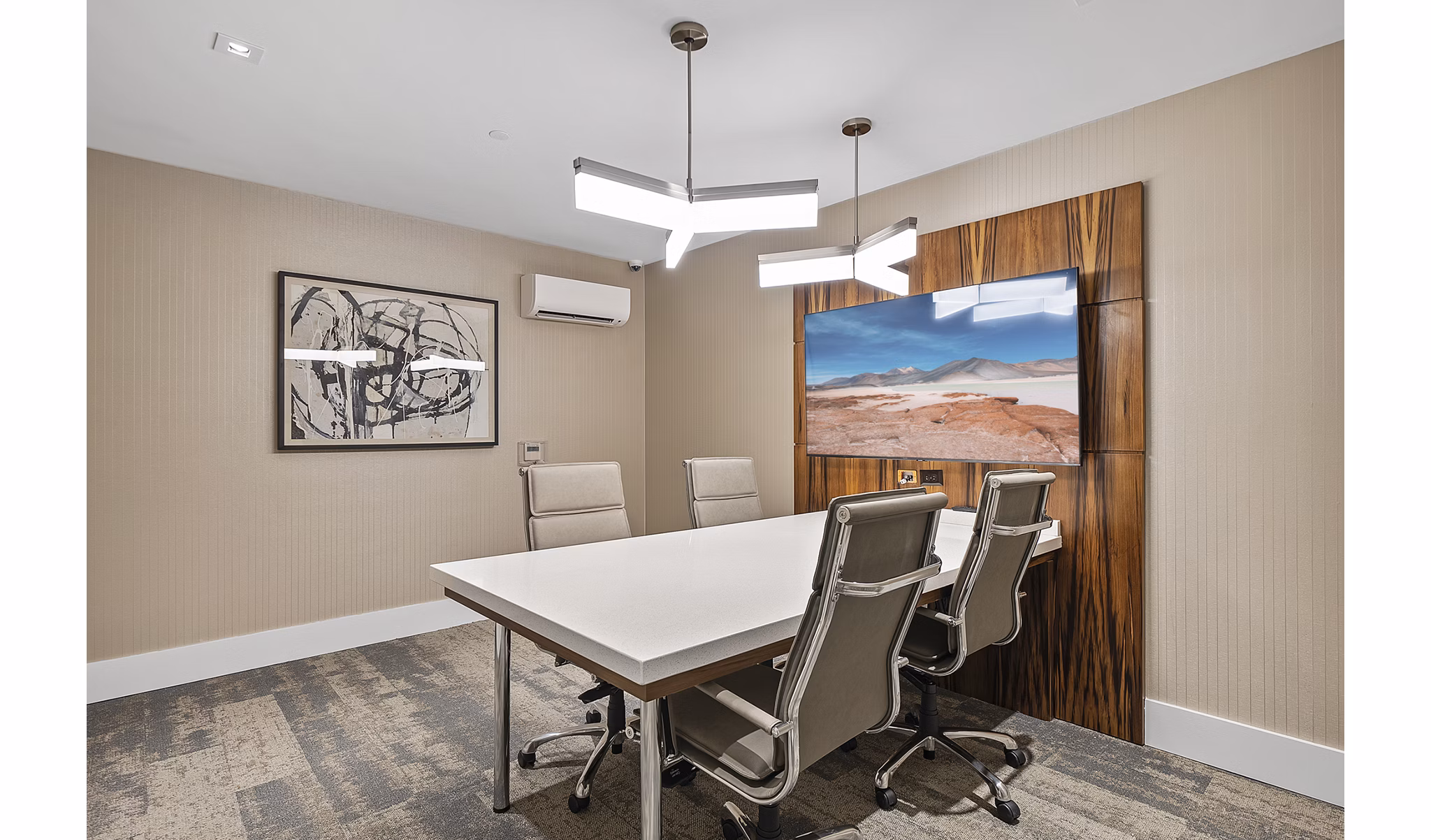 Modern meeting facility at Element SouthPark Apartments with flexible seating and conference technology, ideal for gatherings in luxury setting
