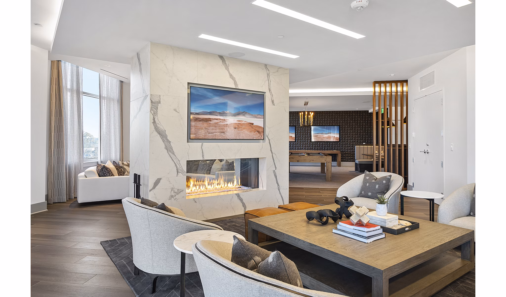 Welcoming clubhouse lobby with modern seating at Element SouthPark Apartments, ideal for socializing and relaxation