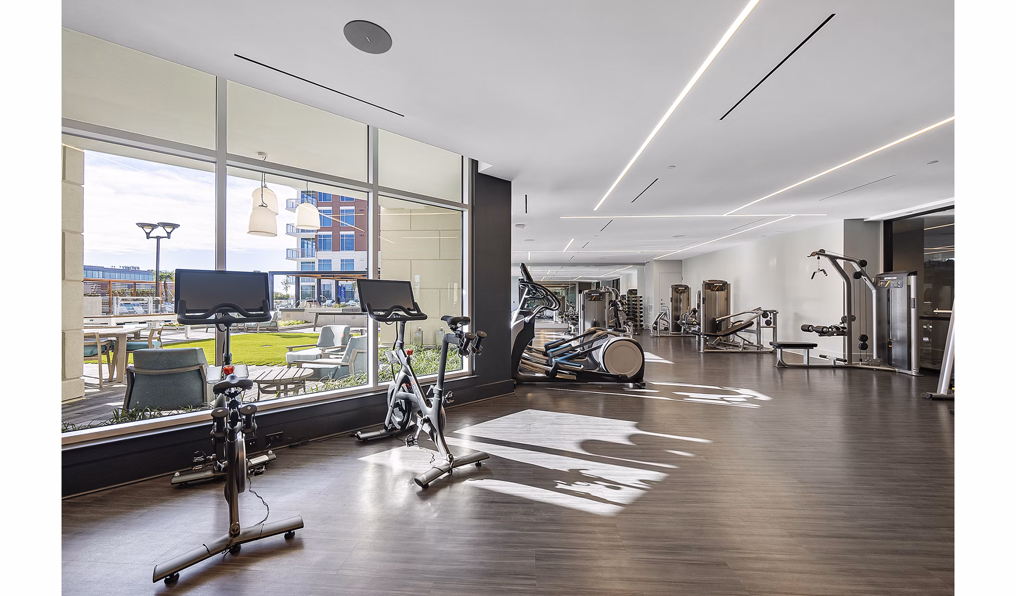 Fully-equipped fitness center at Element SouthPark Apartments with modern amenities for an active lifestyle